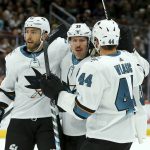 San Jose Sharks center Logan Couture (39) celebrates his goal against the Arizona Coyotes with center Barclay Goodrow, left, and defenseman Marc-Edouard Vlasic (44) during the first period of an NHL hockey game Saturday, Nov. 30, 2019, in Glendale, Ariz. (AP Photo/Ross D. Franklin)