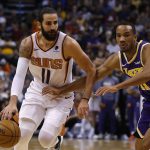 Phoenix Suns guard Ricky Rubio drives past Los Angeles Lakers guard Avery Bradley (11) during the second half of an NBA basketball game Tuesday, Nov. 12, 2019, in Phoenix. (AP Photo/Rick Scuteri)