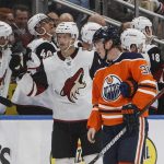 Arizona Coyotes ' Carl Soderberg (34) celebrates a goal as Edmonton Oilers' Joel Persson looks on during second-period NHL hockey game action in Edmonton, Alberta, Monday, Nov. 4, 2019. (Jason Franson/The Canadian Press via AP)