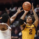 Arizona State's Rob Edwards, right, shoots over Virginia's Braxton Key during the first half of an NCAA college basketball game, Sunday, Nov. 24, 2019, in Uncasville, Conn. (AP Photo/Jessica Hill)