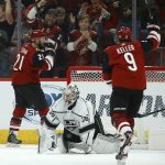 Arizona Coyotes center Derek Stepan (21) celebrates his goal against Los Angeles Kings goaltender Jack Campbell (36) as Coyotes center Clayton Keller (9) also celebrates during the first period of an NHL hockey game Monday, Nov. 18, 2019, in Glendale, Ariz. (AP Photo/Ross D. Franklin)