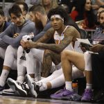 Phoenix Suns sit on the bench during the team's 124-108 loss to the Miami Heat, during the second half of an NBA basketball game Thursday, Nov. 7, 2019, in Phoenix. (AP Photo/Darryl Webb)