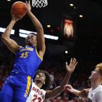 San Jose State forward Ralph Agee (35) shoots in front of Arizona's Zeke Nnaji (22) and Nico Mannion during the first half of an NCAA college basketball game Thursday, Nov. 14, 2019, in Tucson, Ariz. (AP Photo/Rick Scuteri)