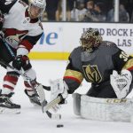 Vegas Golden Knights goaltender Malcolm Subban (30) makes a save beside Arizona Coyotes right wing Michael Grabner (40) during the first period of an NHL hockey game Friday, Nov. 29, 2019, in Las Vegas. (AP Photo/John Locher)