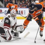 Arizona Coyotes ' goalie Darcy Kuemper (35) makes a save against Edmonton Oilers' Sam Gagner (89) during second-period NHL hockey game action in Edmonton, Alberta, Monday, Nov. 4, 2019. (Jason Franson/The Canadian Press via AP)