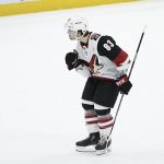 Arizona Coyotes right wing Conor Garland (83) celebrates after he scored a goal during a shootout of an NHL hockey game against the Washington Capitals, Monday, Nov. 11, 2019, in Washington. The Coyotes won 4-3 after a shootout. (AP Photo/Nick Wass)