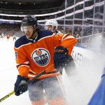 Arizona Coyotes ' Clayton Keller (9) chases Edmonton Oilers' Ethan Bear (74) during first-period NHL hockey game action in Edmonton, Alberta, Monday, Nov. 4, 2019. (Jason Franson/The Canadian Press via AP)