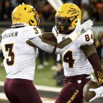 Arizona State running back Eno Benjamin celebrates with wide receiver Frank Darby after Darby scored a touchdown during the first half of an NCAA college football game against Oregon State in Corvallis, Ore., Saturday, Nov. 16, 2019. (AP Photo/Steve Dykes)