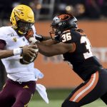 Arizona State quarterback Jayden Daniels is sacked by Oregon State defensive back Mason Moran during the second half of an NCAA college football game in Corvallis, Ore., Saturday, Nov. 16, 2019. Oregon State won 35-34. (AP Photo/Steve Dykes)