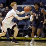Arizona guard Nico Mannion, left, steals the ball intended for Pennsylvania guard Lucas Monroe, right, during the second half of an NCAA college basketball game at the Wooden Legacy tournament in Anaheim, Calif., Friday, Nov. 29, 2019. Arizona won 92-82. (AP Photo/Alex Gallardo)