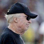 Nike chairman Phil Knight stands on the sideline prior to an NCAA college football game between Oregon and Arizona State, Saturday, Nov. 23, 2019, in Tempe, Ariz. (AP Photo/Matt York)
