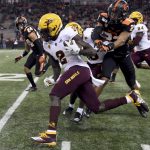 Arizona State wide receiver Brandon Aiyuk dashes past Oregon State defensive back Isaiah Dunn during the first half of an NCAA football game in Corvallis, Ore., Saturday, Nov. 16, 2019. (AP Photo/Steve Dykes)