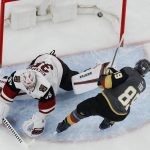 Vegas Golden Knights right wing Alex Tuch scores on Arizona Coyotes goaltender Darcy Kuemper (35) during the shootout in an NHL hockey game Friday, Nov. 29, 2019, in Las Vegas. (AP Photo/John Locher)