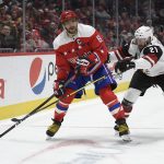 Washington Capitals left wing Alex Ovechkin (8), of Russia, skates with the puck as Arizona Coyotes center Derek Stepan (21) defends during the second period of an NHL hockey game, Monday, Nov. 11, 2019, in Washington. (AP Photo/Nick Wass)