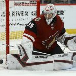 Arizona Coyotes goaltender Darcy Kuemper makes a save on a shot by the Edmonton Oilers during the second period of an NHL hockey game Sunday, Nov. 24, 2019, in Glendale, Ariz. (AP Photo/Ross D. Franklin)
