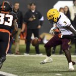 Arizona State running back Eno Benjamin (3) fumbles the ball near the goal line after being hit by Oregon State defensive back David Morris, right, during the second half of an NCAA college football game in Corvallis, Ore., Saturday, Nov. 16, 2019. (AP Photo/Steve Dykes)
