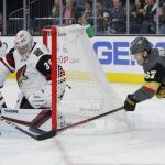 Arizona Coyotes goaltender Darcy Kuemper (35) blocks a wraparound shot by Vegas Golden Knights left wing Max Pacioretty (67) during the second period of an NHL hockey game Friday, Nov. 29, 2019, in Las Vegas. (AP Photo/John Locher)