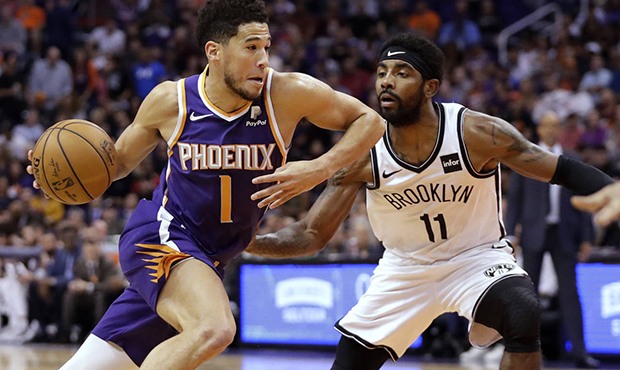 Rubio, Booker lead Suns to thrashing of Nets in bounce-back win