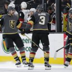 Vegas Golden Knights right wing Alex Tuch, left, celebrates after scoring during the shootout against the Arizona Coyotes in an NHL hockey game Friday, Nov. 29, 2019, in Las Vegas. (AP Photo/John Locher)