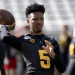 Arizona State quarterback Jayden Daniels (5) warms up his teammates prior to an NCAA college football game against Southern California, Saturday, Nov. 9, 2019, in Tempe, Ariz. Daniels did not suit up due to an injury. (AP Photo/Matt York)