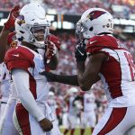 Arizona Cardinals quarterback Kyler Murray, left, is congratulated by Arizona Cardinals wide receiver KeeSean Johnson after scoring against the San Francisco 49ers during the second half of an NFL football game in Santa Clara, Calif., Sunday, Nov. 17, 2019. (AP Photo/Josie Lepe)