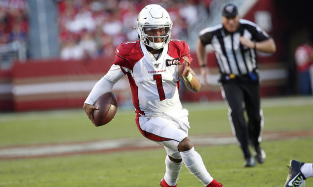 Arizona Cardinals quarterback Kyler Murray (1) runs for a touchdown against the San Francisco 49ers...
