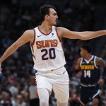 Phoenix Suns forward Dario Saric argues for a call after hitting a three-point basket against the Denver Nuggets in the first half of an NBA basketball game Sunday, Nov. 24, 2019, in Denver. (AP Photo/David Zalubowski)