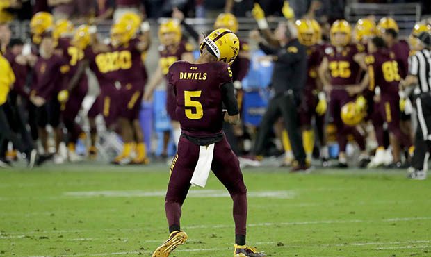 Arizona State quarterback Jayden Daniels (5) reacts toward the bench after throwing for an 81-yard ...