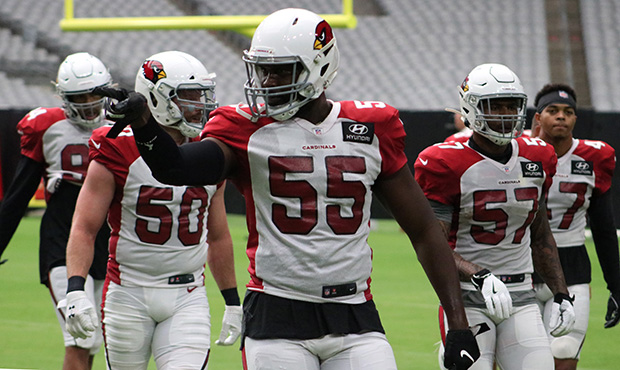 Arizona Cardinals’ Chandler Jones points to the crowd during the team’s training camp Sunday, J...