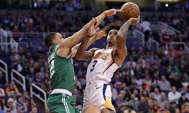 Phoenix Suns forward Kelly Oubre Jr. (3) shoots as Boston Celtics forward Grant Williams defends du...