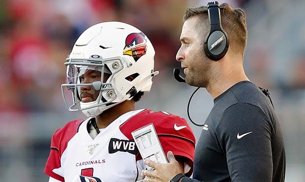 Arizona Cardinals quarterback Kyler Murray, left, talks with head coach Kliff Kingsbury during the ...