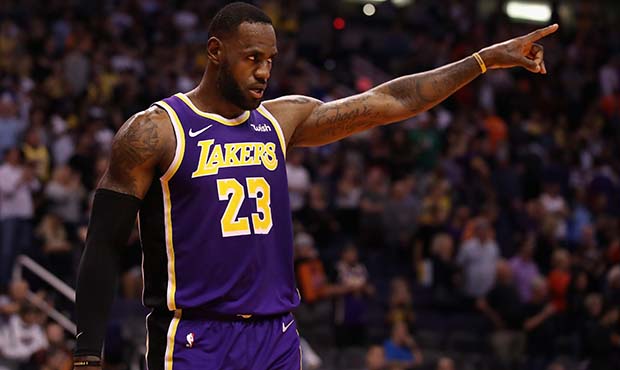 LeBron James #23 of the Los Angeles Lakers reacts during the final moments of the NBA game against ...