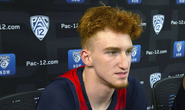 In this Oct. 8, 2019, file photo, Arizona's Nico Mannion speaks at the Pac-12 NCAA college basketba...