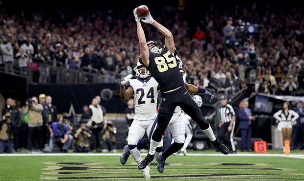 Dan Arnold #85 of the New Orleans Saints misses a catch in the end zone against the Los Angeles Ram...