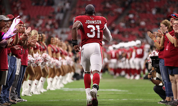 Running back David Johnson #31 of the Arizona Cardinals runs out to the NFL preseason game against ...