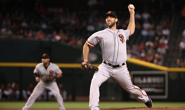 Starting pitcher Madison Bumgarner #40 of the San Francisco Giants pitches against the Arizona Diam...