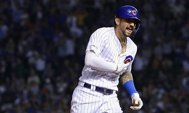 Nicholas Castellanos #6 of the Chicago Cubs celebrates as he runs the bases after hitting a three r...