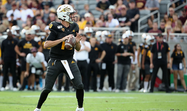 Quarterback Joey Yellen #18 of the Arizona State Sun Devils drops back to pass during the NCAAF gam...