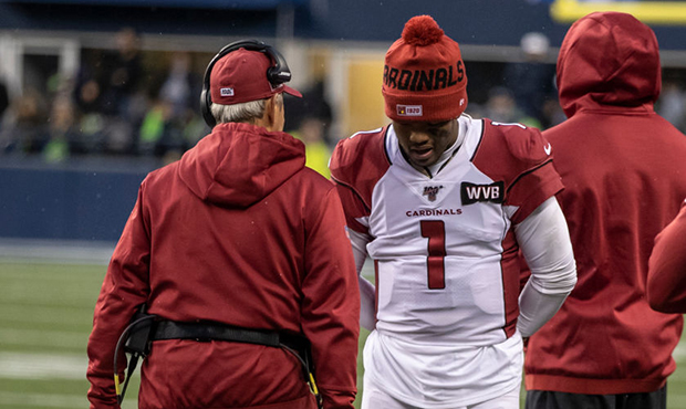 Quarterback Kyler Murray #1 of the Arizona Cardinals stands on the sideline after sustaining a leg ...