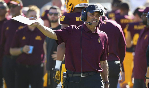 Arizona State head coach Herm Edwards shouts instructions during the second half of an NCAA college...