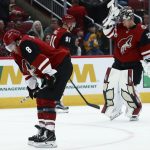 Arizona Coyotes center Nick Schmaltz (8), left wing Taylor Hall (91) and goaltender Antti Raanta (32) pause on the ice after a goal by Minnesota Wild center Luke Kunin during the third period of an NHL hockey game Thursday, Dec. 19, 2019, in Glendale, Ariz. The Wild won 8-5. (AP Photo/Ross D. Franklin)