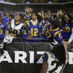 Los Angeles Rams running back Darrell Henderson (27) greets fans after an NFL football game against the Arizona Cardinals, Sunday, Dec. 1, 2019, in Glendale, Ariz. The Rams won 34-7. (AP Photo/Ross D. Franklin)