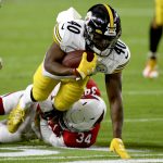 Pittsburgh Steelers running back Kerrith Whyte (40) is tackled by Arizona Cardinals strong safety Jalen Thompson (34)during the first half of an NFL football game, Sunday, Dec. 8, 2019, in Glendale, Ariz. (AP Photo/Ross D. Franklin)