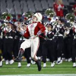 The Ohio State band performs before the Fiesta Bowl NCAA college football playoff game between Ohio State and Clemson on Saturday, Dec. 28, 2019, in Glendale, Ariz. (AP Photo/Ross D. Franklin)