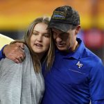 Air Force head coach Troy Calhoun celebrates with his daughter Amelia after defeating Washington State 31-21 during the Cheez-It Bowl NCAA college football game, Friday, Dec. 27, 2019, in Phoenix. (AP Photo/Rick Scuteri)