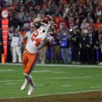 Clemson safety Nolan Turner (24) intercepts an Ohio State pass during the final minute of the Fiesta Bowl NCAA college football playoff semifinal Saturday, Dec. 28, 2019, in Glendale, Ariz.(AP Photo/Rick Scuteri)
