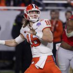 Clemson quarterback Trevor Lawrence throws a pass against Ohio State during the second half of the Fiesta Bowl NCAA college football playoff semifinal Saturday, Dec. 28, 2019, in Glendale, Ariz. (AP Photo/Rick Scuteri)