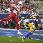 Arizona Cardinals tight end Dan Arnold catches a touchdown pass in front of Los Angeles Rams defensive back David Long during first half of an NFL football game Sunday, Dec. 29, 2019, in Los Angeles. (AP Photo/Mark J. Terrill)