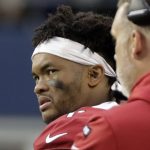 Arizona Cardinals quarterback Kyler Murray watches from the sideline after leaving an NFL football game against the Seattle Seahawks in the second half with an injury, Sunday, Dec. 22, 2019, in Seattle. (AP Photo/Lindsey Wasson)