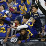 Los Angeles Rams fans cheer after an NFL football game against the Arizona Cardinals, Sunday, Dec. 1, 2019, in Glendale, Ariz. The Rams won 34-7. (AP Photo/Ross D. Franklin)